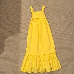 Woman’s yellow sun dress